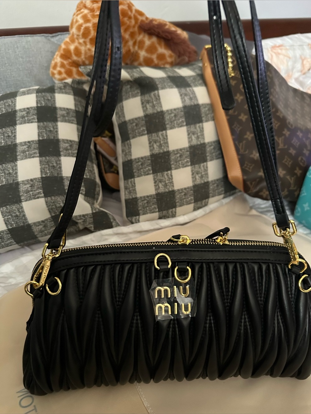 Black crossbody Women's Bag with Gold Hardware. Not authentic